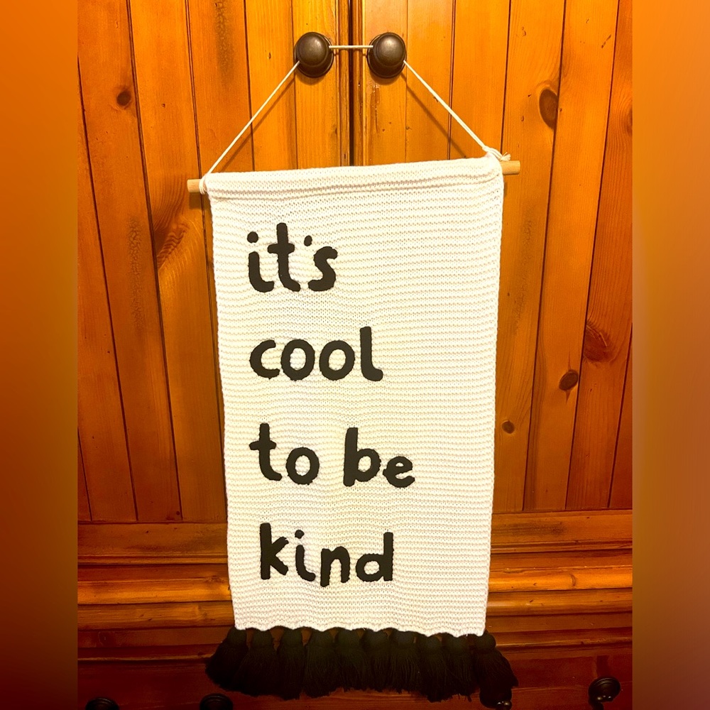 It’s cool to be kind knitted sign.